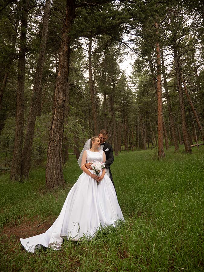 Golden Colorado pines wedding